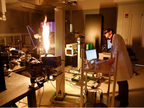 PhD student, Wesley Boyette, uses a four-camera system to examine a turbulent sooting flame, which is important in gas turbines.