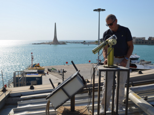 Georgiy Stenchikov at the Kaust AERONET station established in 2012. The NASA-Aeronet instruments measure aerosol abundance and size distribution, detect dust storms, and quantify dust effect on radiation transport in the atmosphere, specifically solar fluxes.