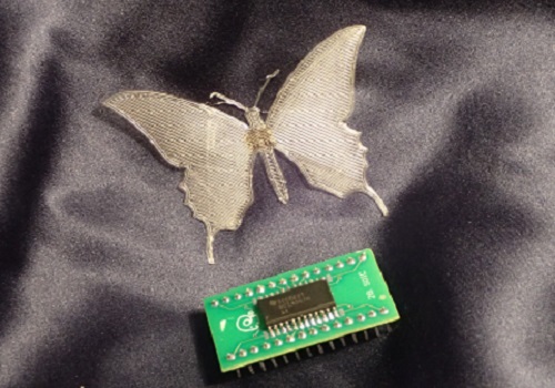 Pressure-sensitive "e-stickers" contain all the functionality of traditional silicon circuits but can be fabricated into complex, flexible shapes such as butterflies.