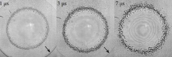 Images of the first few microseconds after a water droplet strikes a coated slide show how microbubbles form at the location of first contact and coalesce into larger bubbles as the droplet spreads.