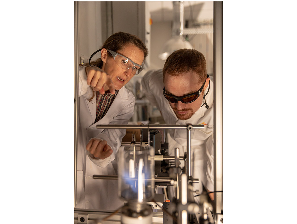 Deanna Lacoste (left) and her student Francesco Di Sabatino discuss the advantages of the setup.