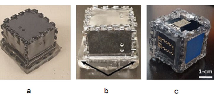 Steps to create a floating multidimensional integrated circuit: a) the MD-IC is encapsulated with a bio-safe polymer, b) with an asymmetric base to enable it to float but stay right-way up and c) with a solar cell on top and water sensors on the bottom.