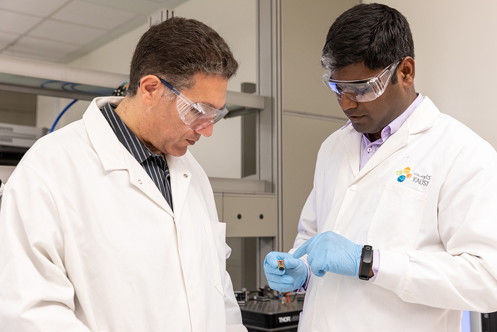 Khaled Salama (left) and Sandeep Surya discuss how they plan to replace the silicon platform with a flexible material and reduce the power consumption of the device.