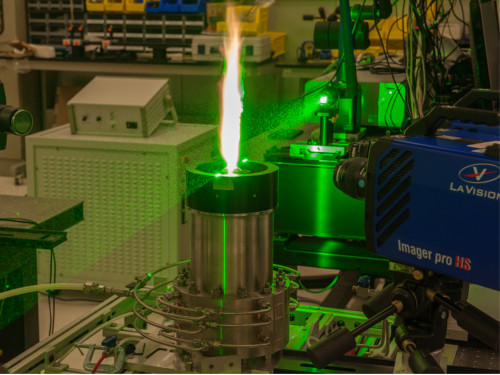 A green laser and camera system are used to do scattering measurements in a turbulent sooting flame.