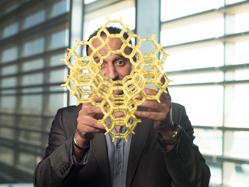 KAUST's Mohamed Eddaoudi shows off a model MOF at the University.