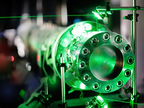 End section of the shock tube. A green laser beam passes through the optical ports of the shock tube.