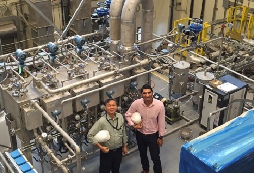 Kim Choon Ng and Muhammad Wakil inspect the MEDAD hybrid desalination pilot at KAUST.