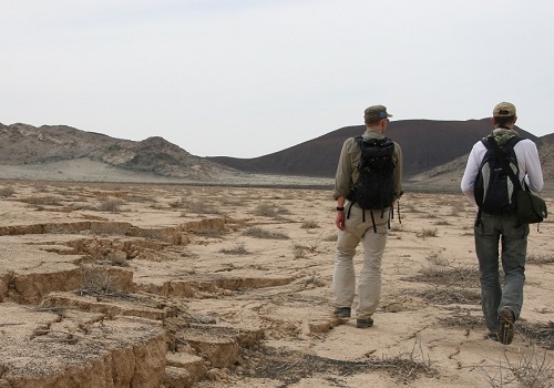 KAUST researchers at the site of the volcanic unrest in Harrat Lunayyir, Saudi Arabia. The team believes that fracturing and subsidence on the surface caused by magmatic activity below actually prevented a volcanic eruption taking place in 2009.
