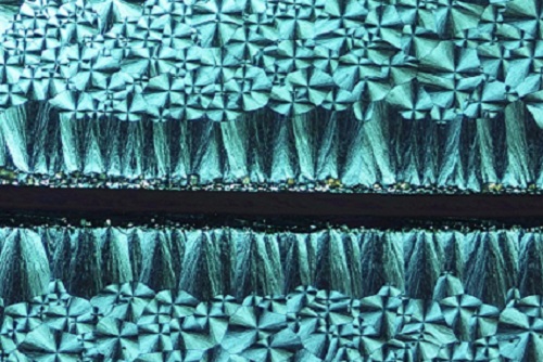 Crystallization behavior can be controlled locally, creating regions with different crystal patterns.