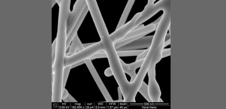 The scanning electron microscope (SEM) image shows that the Ag nanowires are completely connected after laser treatment.