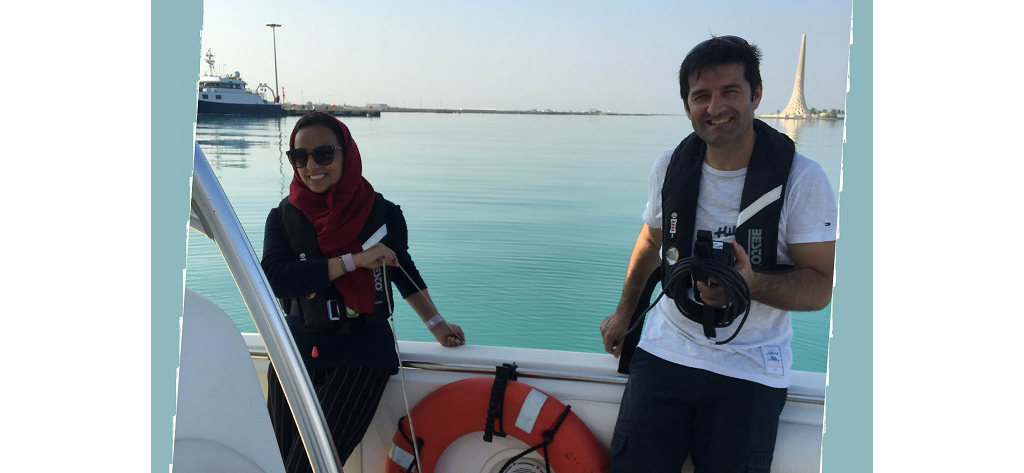 Eman Sabbagh and Miguel Viegas measure temperature and salinity after collecting the weekly surface water sample from KAUST Harbor.