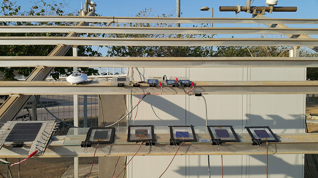 Encapsulated perovskite/silicon tandem solar cells  under testing at a KAUST outdoor test facility.
