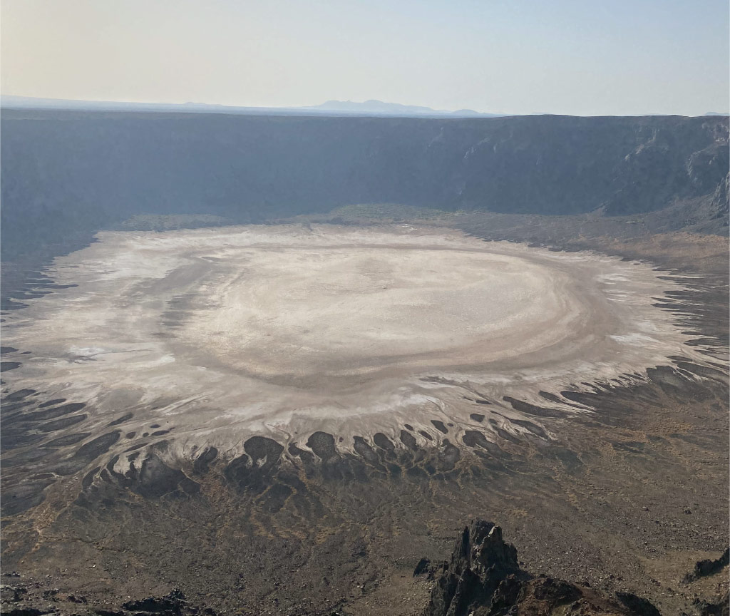 Saudi Arabia's extreme environments, such as the Al Wahbah crater pictured above, may harbor useful extremophile bacteria.